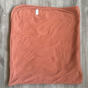 Double lined ribbed organic cotton baby blanket.